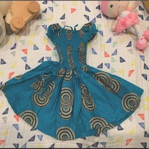 Blue girl’s pattern summer dress